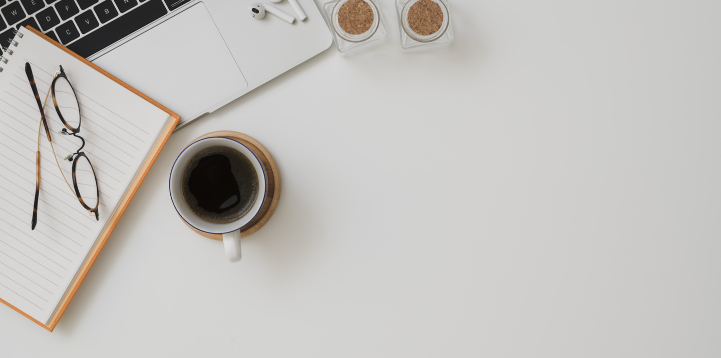 Photo Of Ceramic Mug Near Notebook